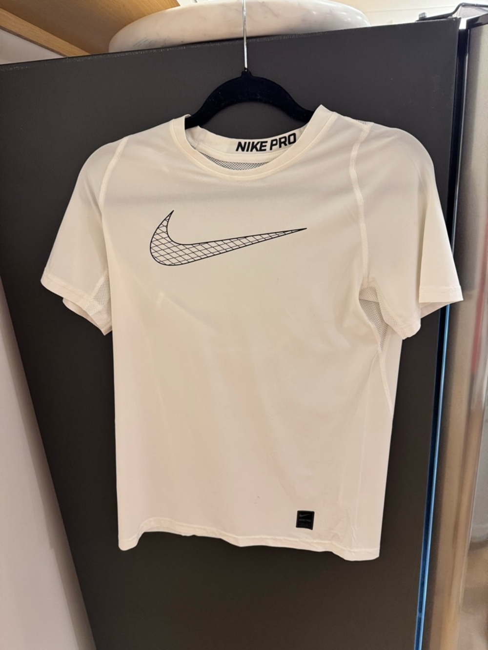 Nike White Short-Sleeve Performance Tee with Black Swoosh